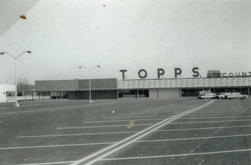 Topps, on the east side of Secor north of Central. 