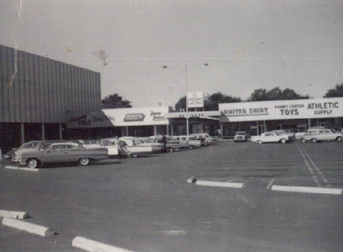 Center of Westgate, with the Lion Store on the left, circa 1965. Courtesy of the Toledo-Lucas County Public Library, obtained from http://images2.toledolibrary.org/.